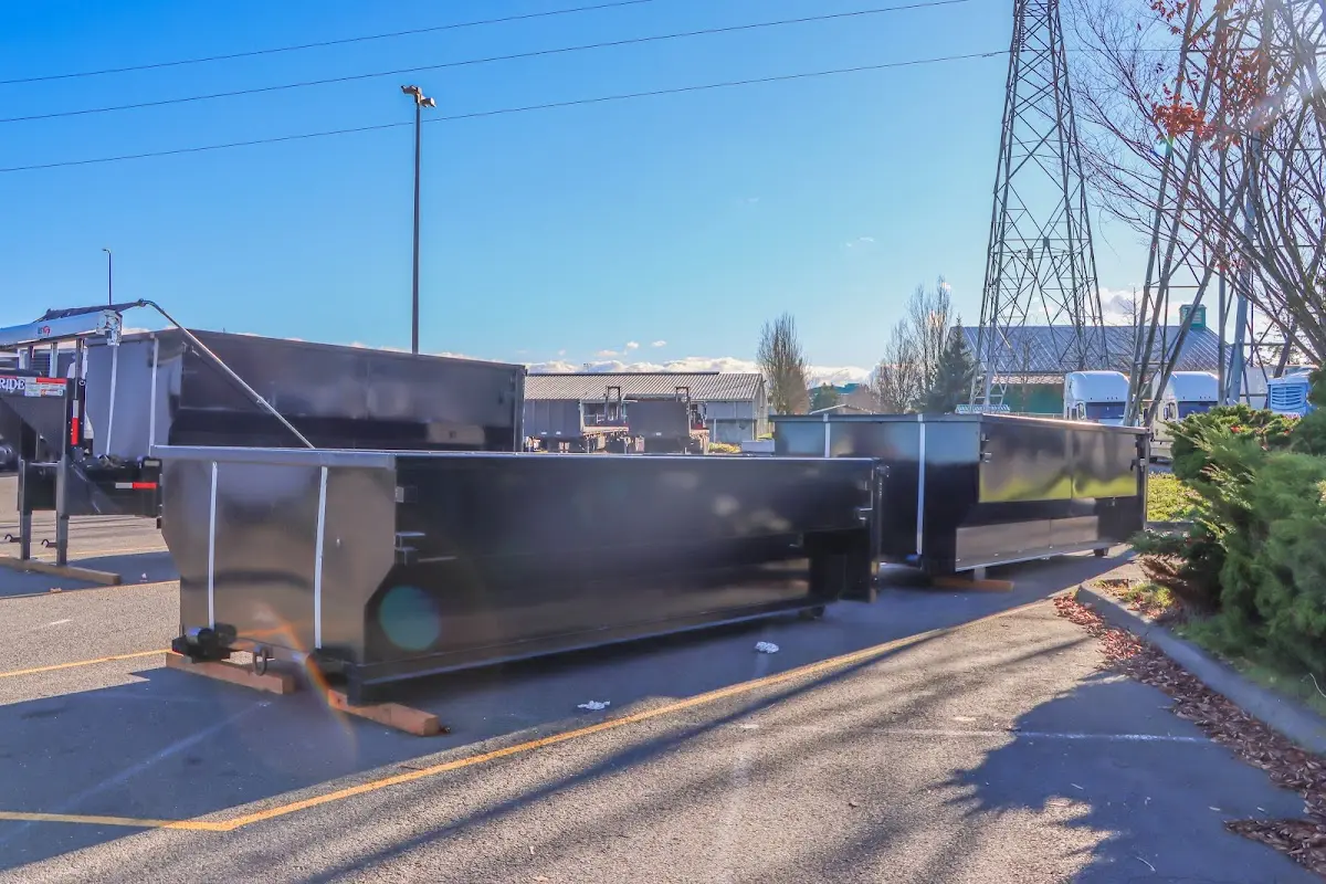 Roll-off dumpster ready for waste disposal at job site for 6 Yard Dumpster Rental in Delano